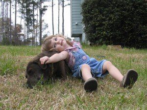 Girl Playing with Dog